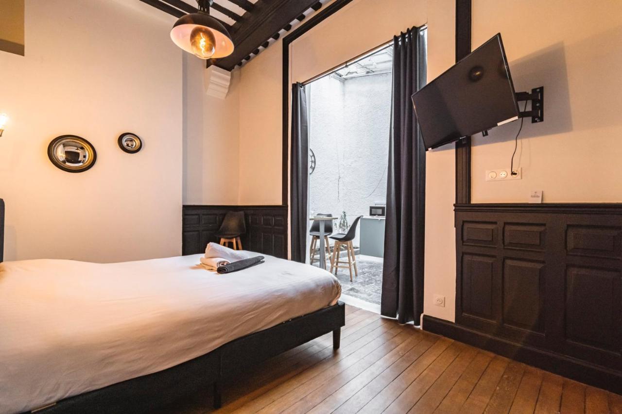 Tournelles Vue Cathedrale- Maison Climatisee Du Xvie Siecle Classee Apartment แร็งส์ ภายนอก รูปภาพ
